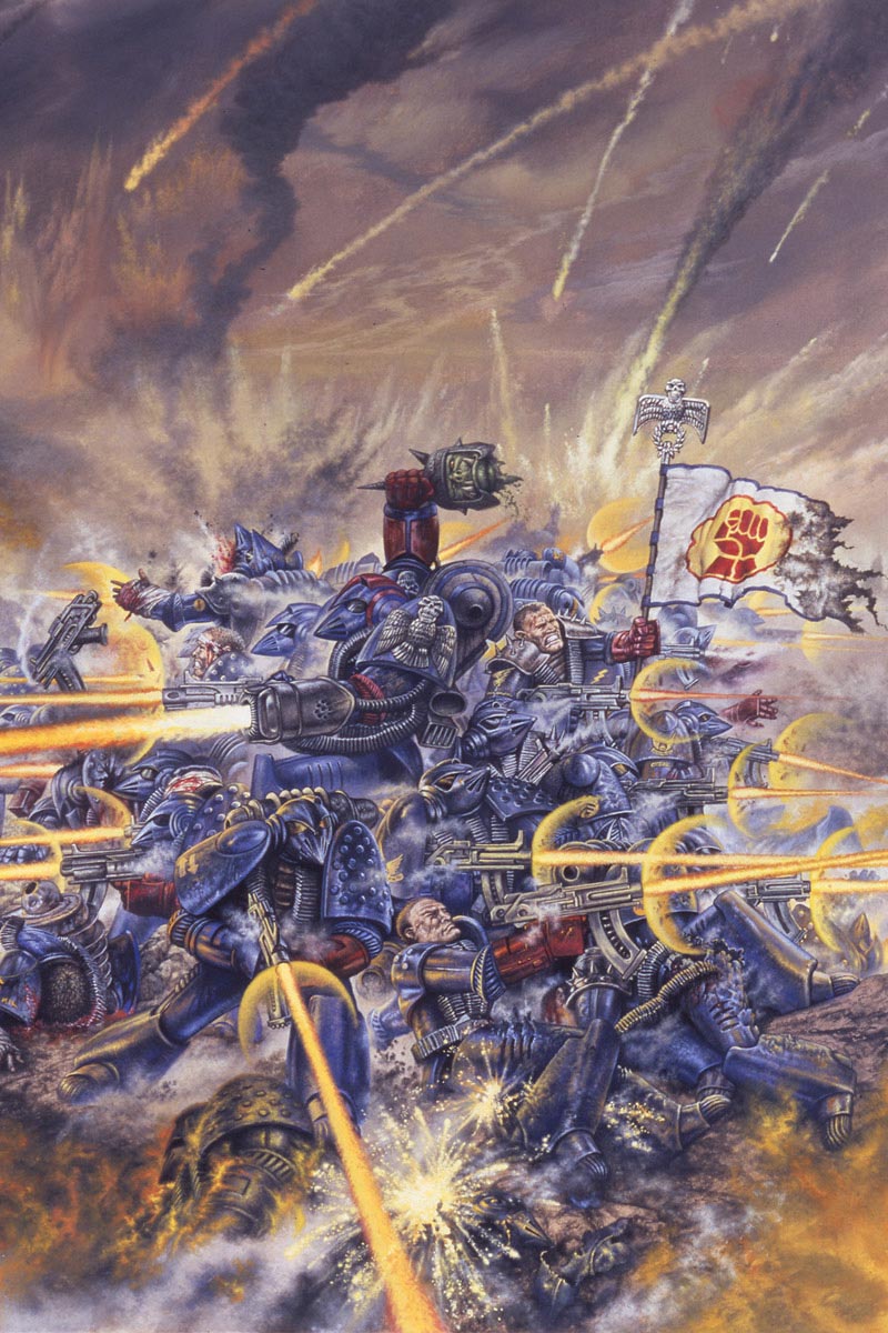 Crimson Fist Space Marines defend a hill from marauding Orks a seminal image from the Warhammer 40,000 universe.